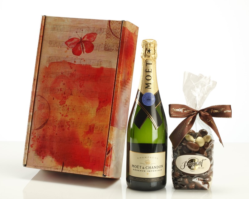 bottle of champagne moet chandon with choccolates